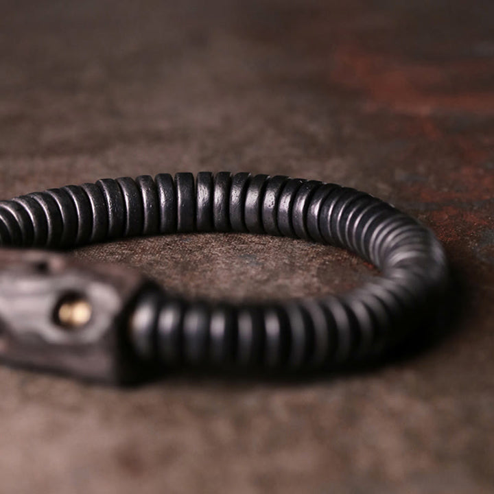 Bracciale Buddha Stones in legno di ebano, rame e ottone con fori per l'equilibrio - image 3