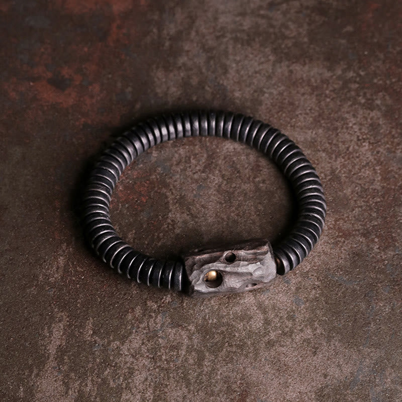 Bracciale Buddha Stones in legno di ebano, rame e ottone con fori per l'equilibrio - image 1
