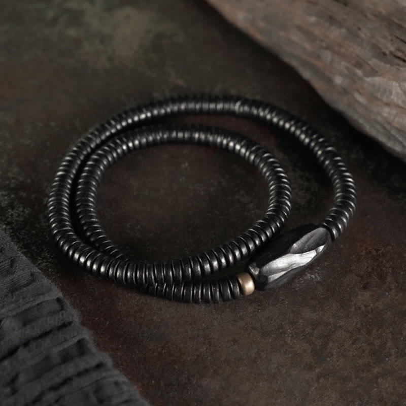 Braccialetto triplo giro in ottone e rame in legno di ebano Buddha Stones