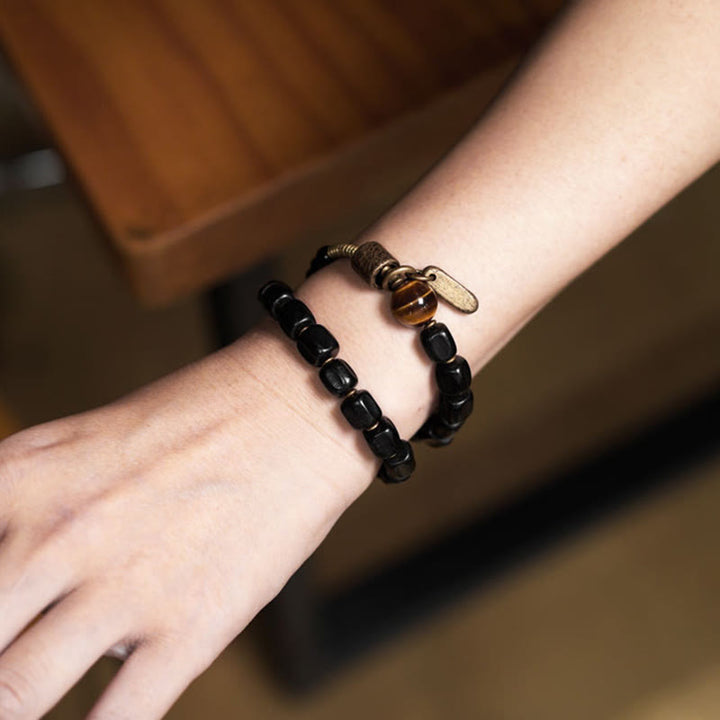 Braccialetto doppio giro Buddha Stones Ebano Legno Rame Ottone Occhio di Tigre Pace