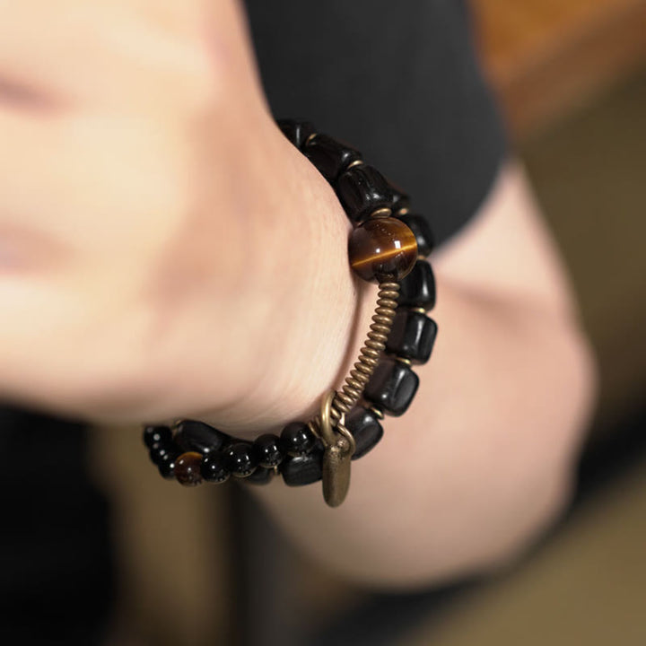 Braccialetto doppio giro Buddha Stones Ebano Legno Rame Ottone Occhio di Tigre Pace