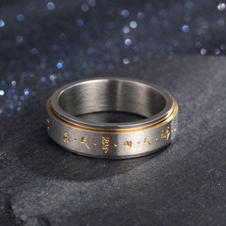 Anello girevole in acciaio al titanio con mantra tibetano Buddha Stones
