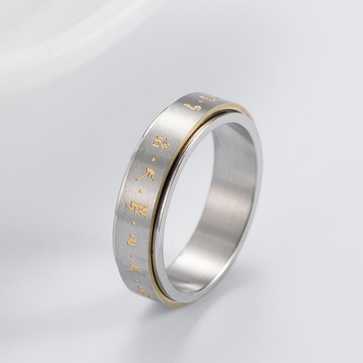 Anello girevole in acciaio al titanio con mantra tibetano Buddha Stones