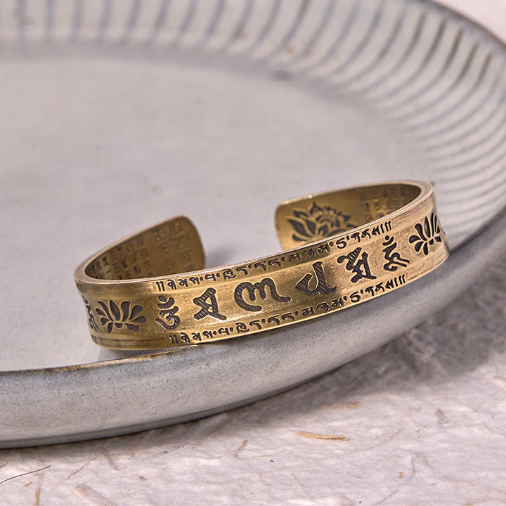 Buddha Stones Sei parole vere 'om Mani Padme Hum' Sutra del cuore Loto Rame Ottone Pace Braccialetto Braccialetto