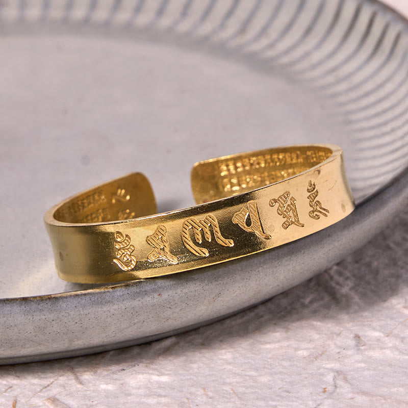Buddha Stones Sei parole vere 'om Mani Padme Hum' Sutra del cuore Bracciale rigido in ottone e rame per la pace interiore