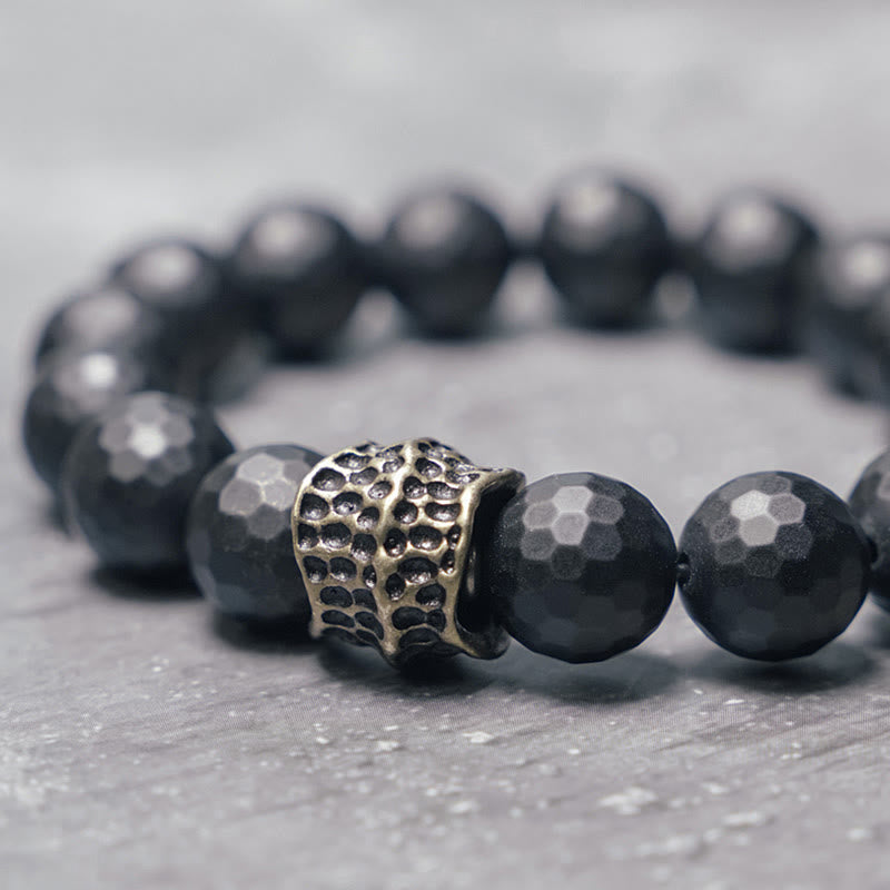 Braccialetto di protezione in ottone e rame con onice nero opaco Buddha Stones