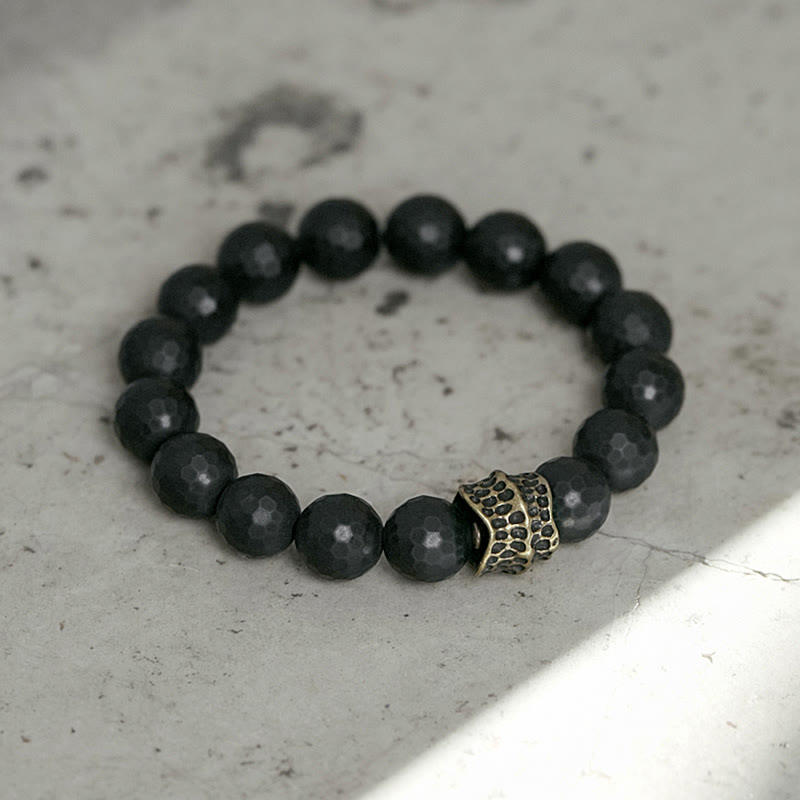 Braccialetto di protezione in ottone e rame con onice nero opaco Buddha Stones