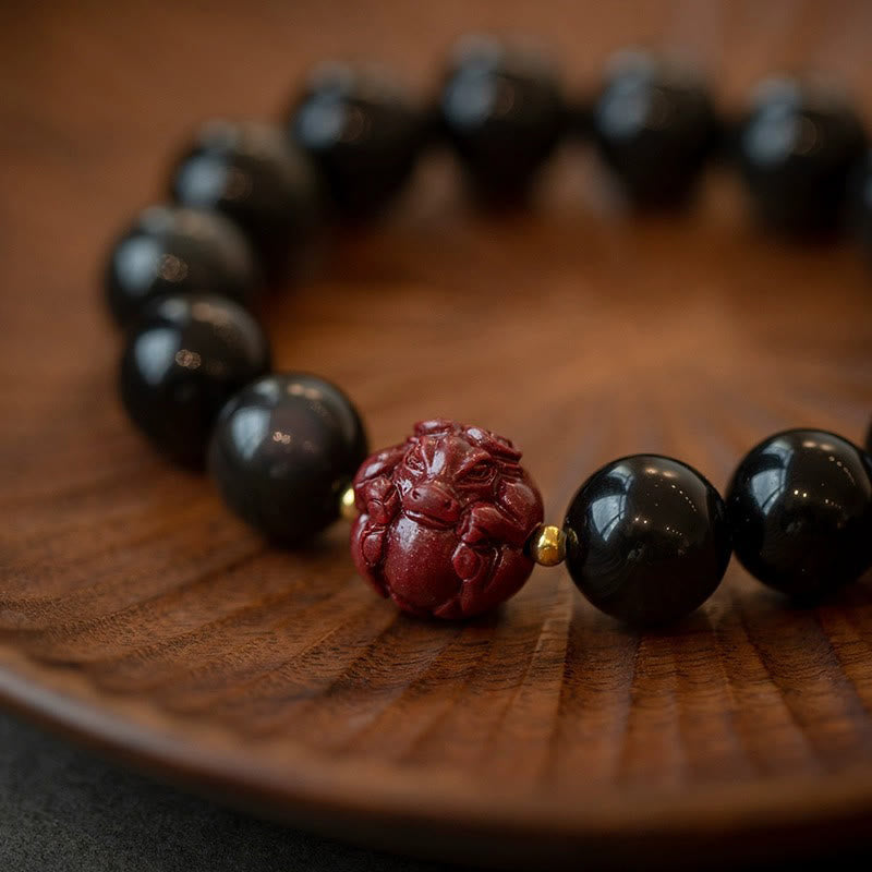 Braccialetto di purificazione naturale in ossidiana nera e cinabro dello zodiaco cinese Buddha Stones