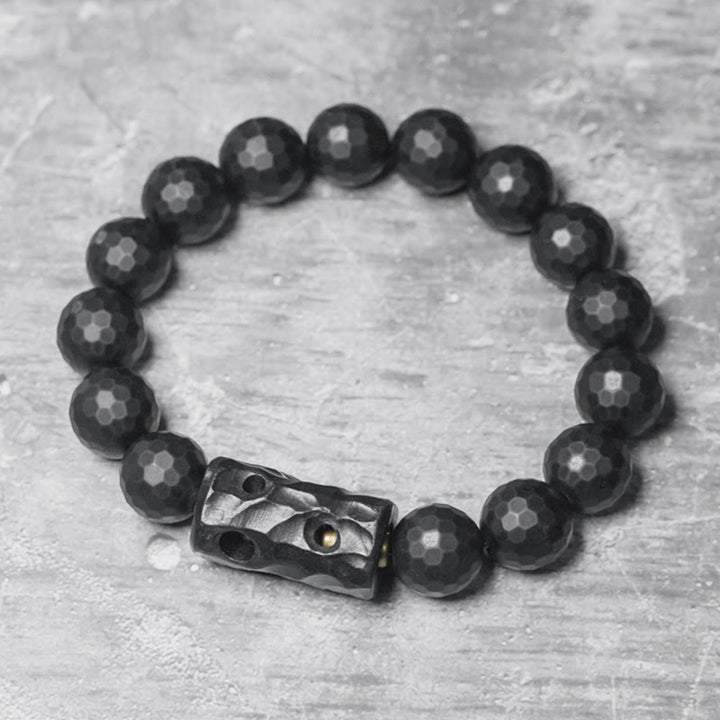 Braccialetto di protezione in ebano e onice nero con superficie satinata opaca Buddha Stones