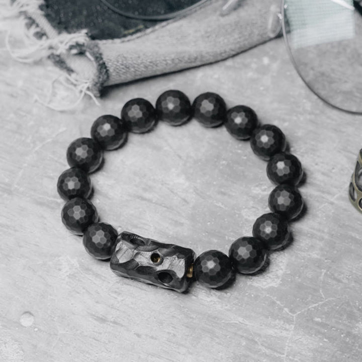 Braccialetto di protezione in ebano e onice nero con superficie satinata opaca Buddha Stones