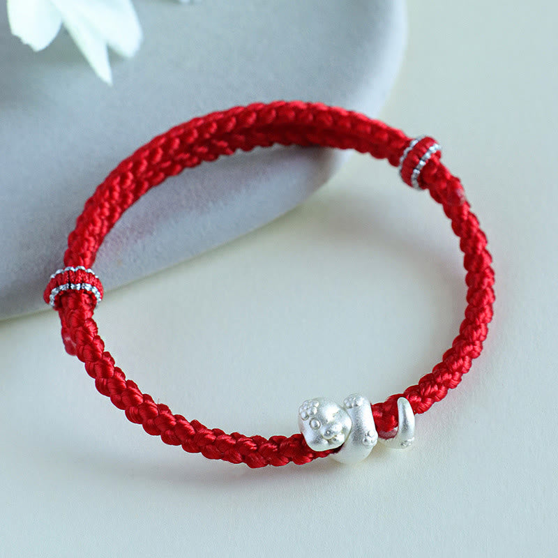 Braccialetto intrecciato con corda rossa dell'anno del serpente in argento sterling 999 fatto a mano Buddha Stones