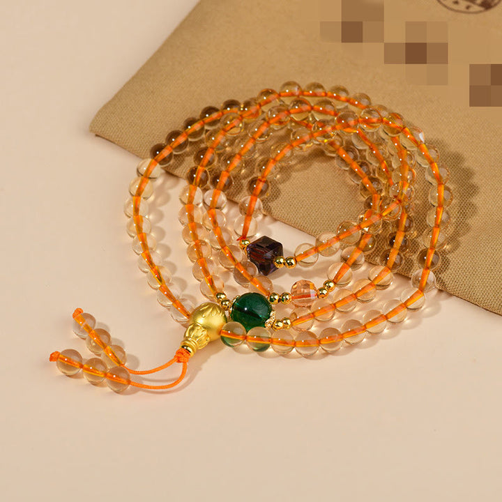Braccialetto della felicità con 108 perle di Mala in citrino Buddha Stones