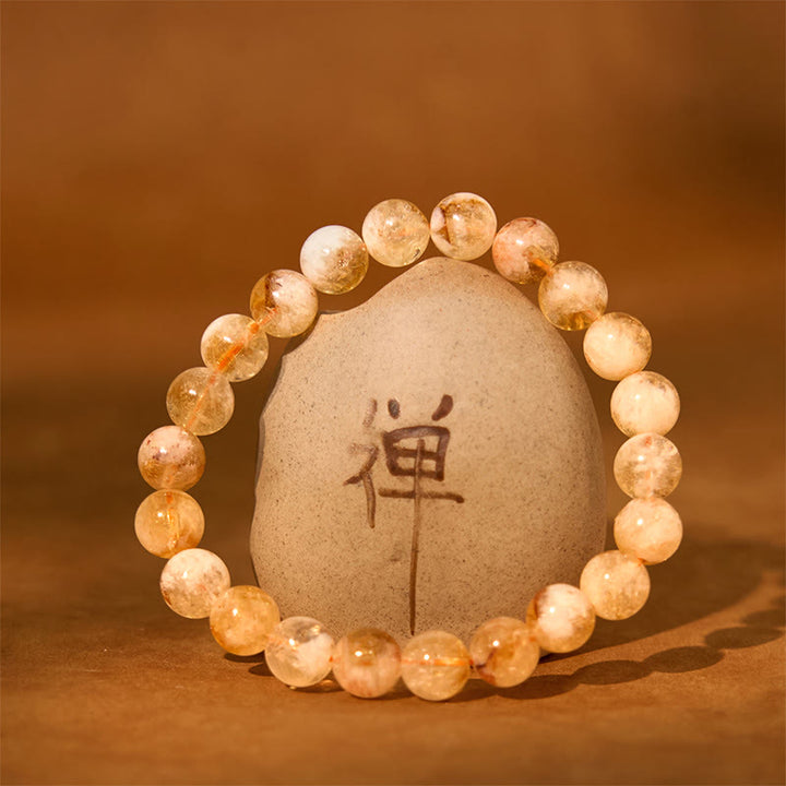Braccialetto della prosperità con cristallo di fiocco di neve e citrino naturale Buddha Stones