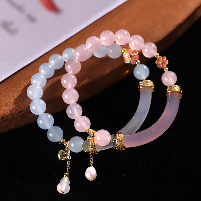 Braccialetto a metà polsino in perle di calcedonio blu e cristallo rosa Buddha Stones