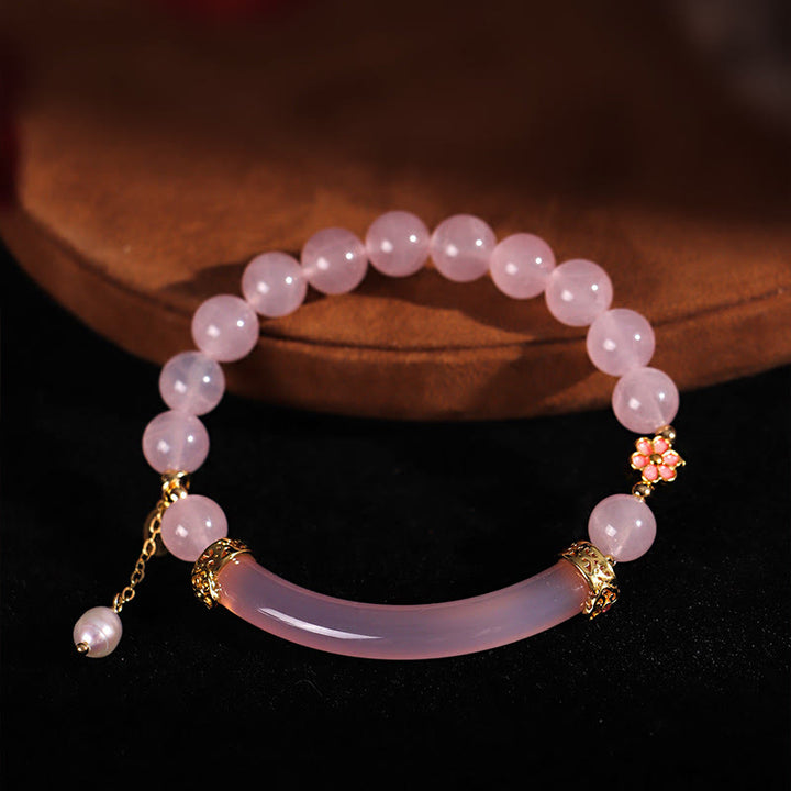 Braccialetto a metà polsino in perle di calcedonio blu e cristallo rosa Buddha Stones