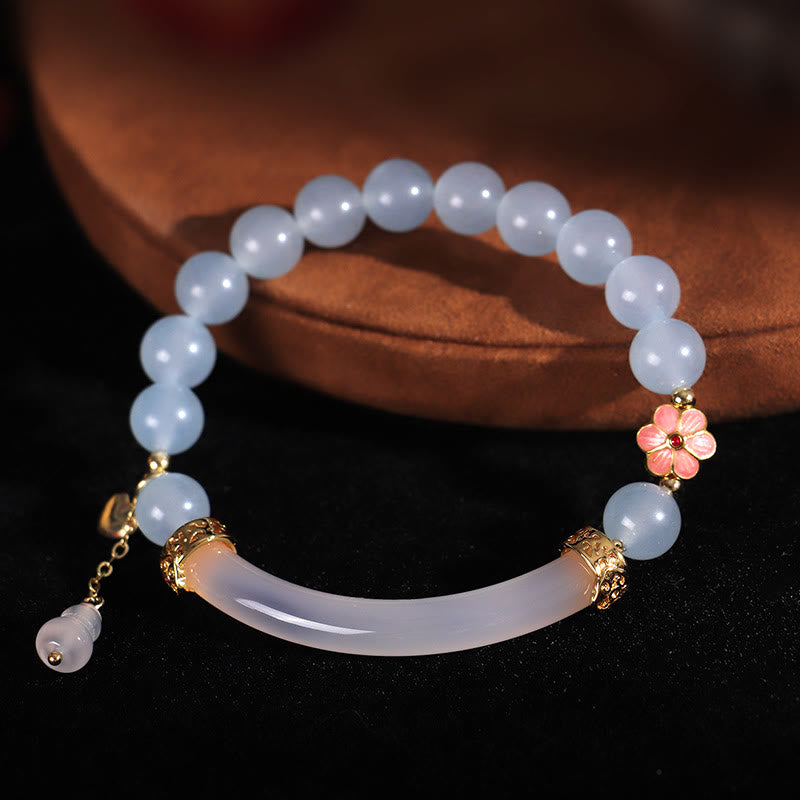Braccialetto a metà polsino in perle di calcedonio blu e cristallo rosa Buddha Stones