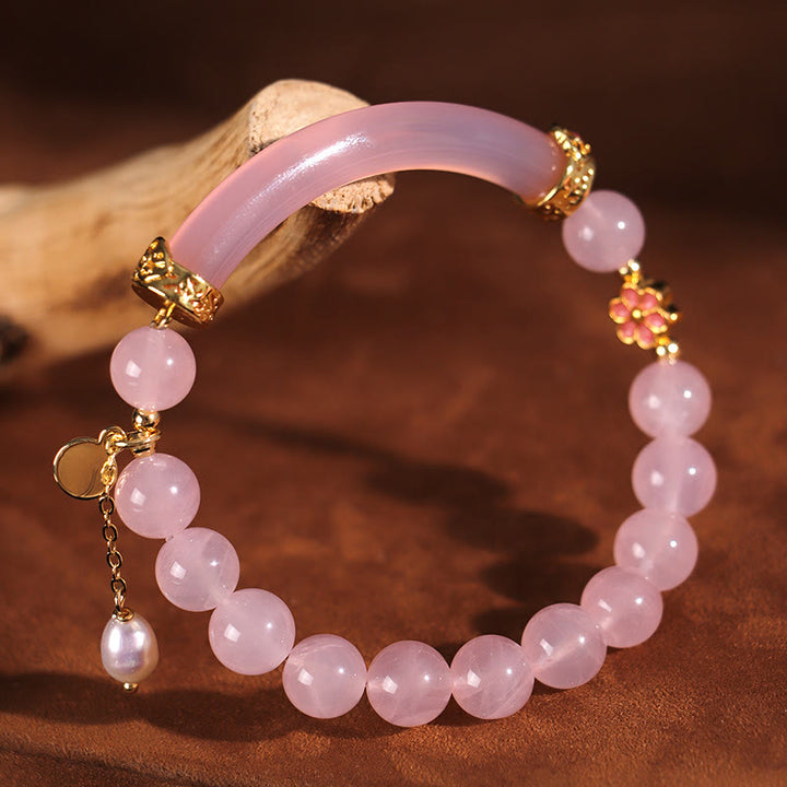 Braccialetto a metà polsino in perle di calcedonio blu e cristallo rosa Buddha Stones