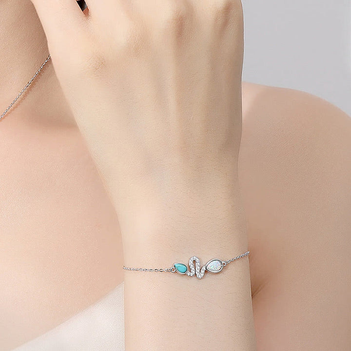 Braccialetto di protezione dell'anno del serpente in argento sterling 925 con Buddha Stones e opale turchese
