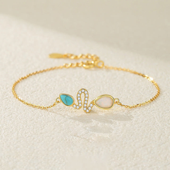 Braccialetto di protezione dell'anno del serpente in argento sterling 925 con Buddha Stones e opale turchese