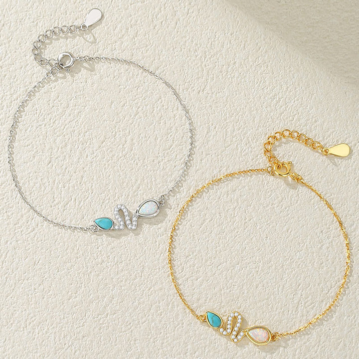 Braccialetto di protezione dell'anno del serpente in argento sterling 925 con Buddha Stones e opale turchese