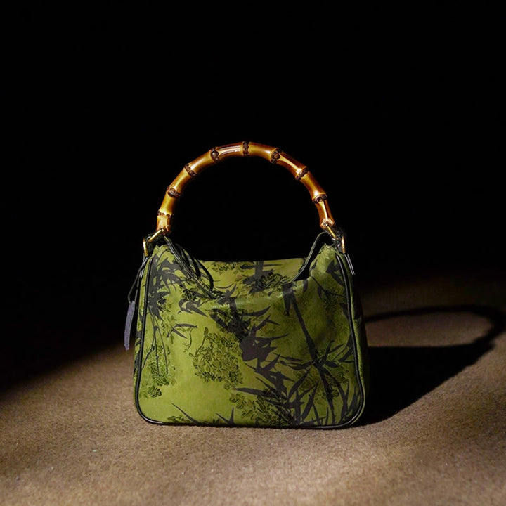 Borsa a tracolla in seta Xiangyunsha con manico in bambù lussureggiante Buddha Stones