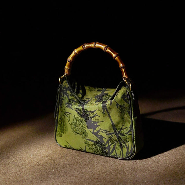 Borsa a tracolla in seta Xiangyunsha con manico in bambù lussureggiante Buddha Stones