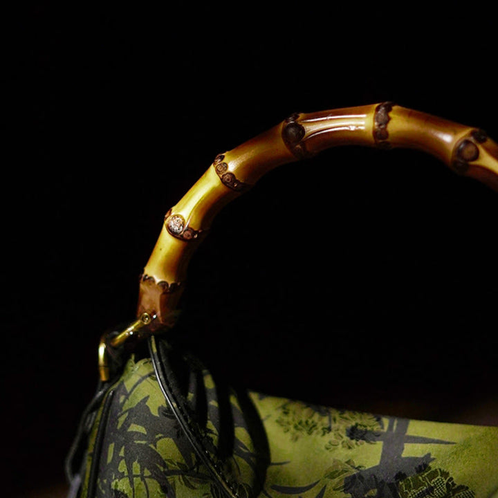 Borsa a tracolla in seta Xiangyunsha con manico in bambù lussureggiante Buddha Stones