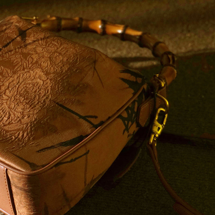 Borsa a tracolla in seta Xiangyunsha con manico in bambù lussureggiante Buddha Stones