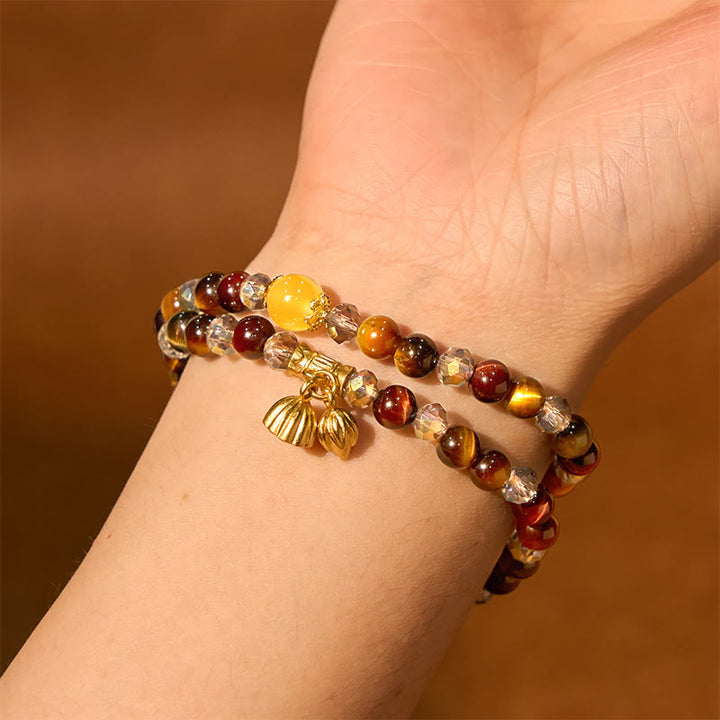 Braccialetto di protezione elastico multi-cerchio con occhio di tigre colorato Buddha Stones Lotus