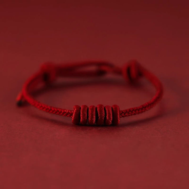 Braccialetto di forza con corda rossa a otto fili Buddha Stones