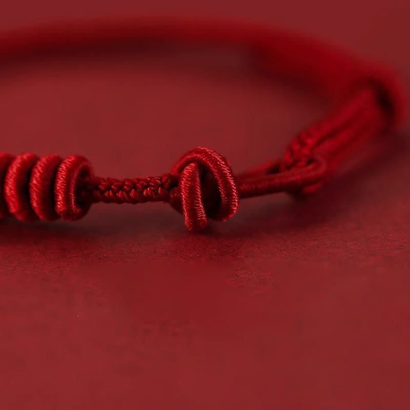 Braccialetto di forza con corda rossa a otto fili Buddha Stones