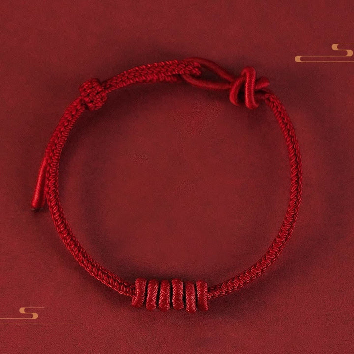 Braccialetto di forza con corda rossa a otto fili Buddha Stones