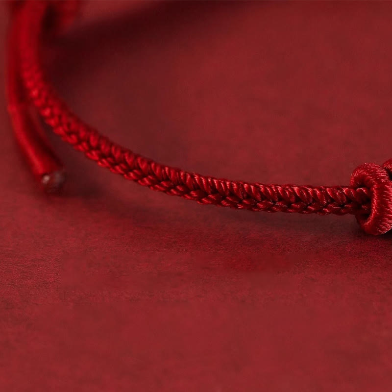 Braccialetto di forza con corda rossa a otto fili Buddha Stones
