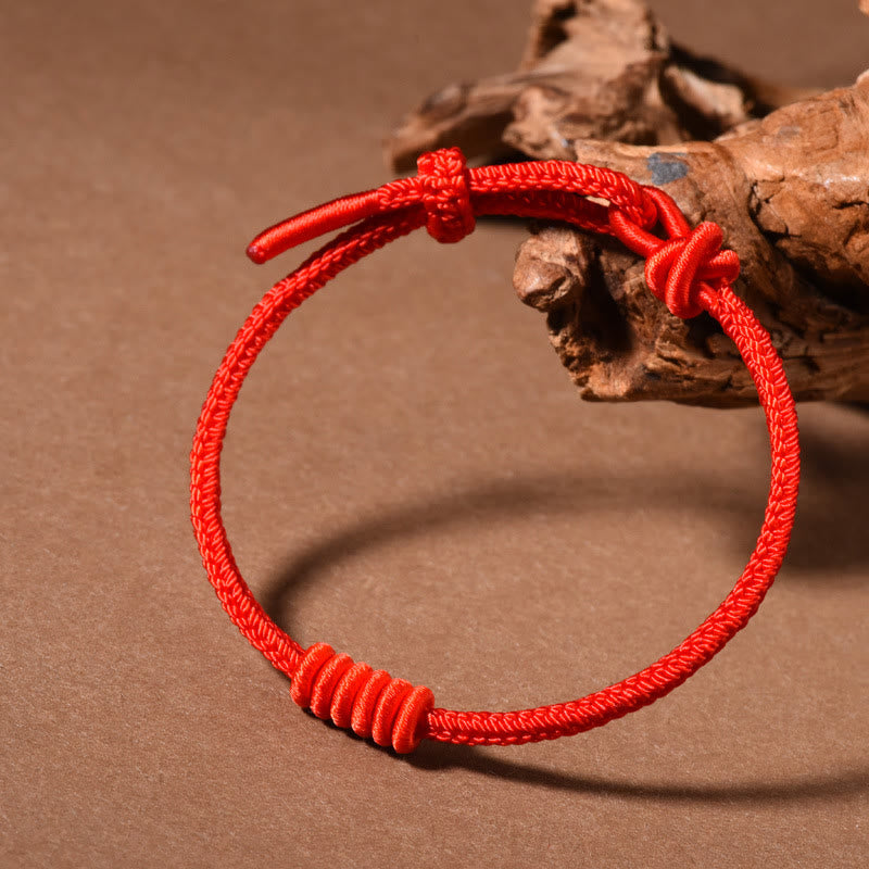 Braccialetto di forza con corda rossa a otto fili Buddha Stones