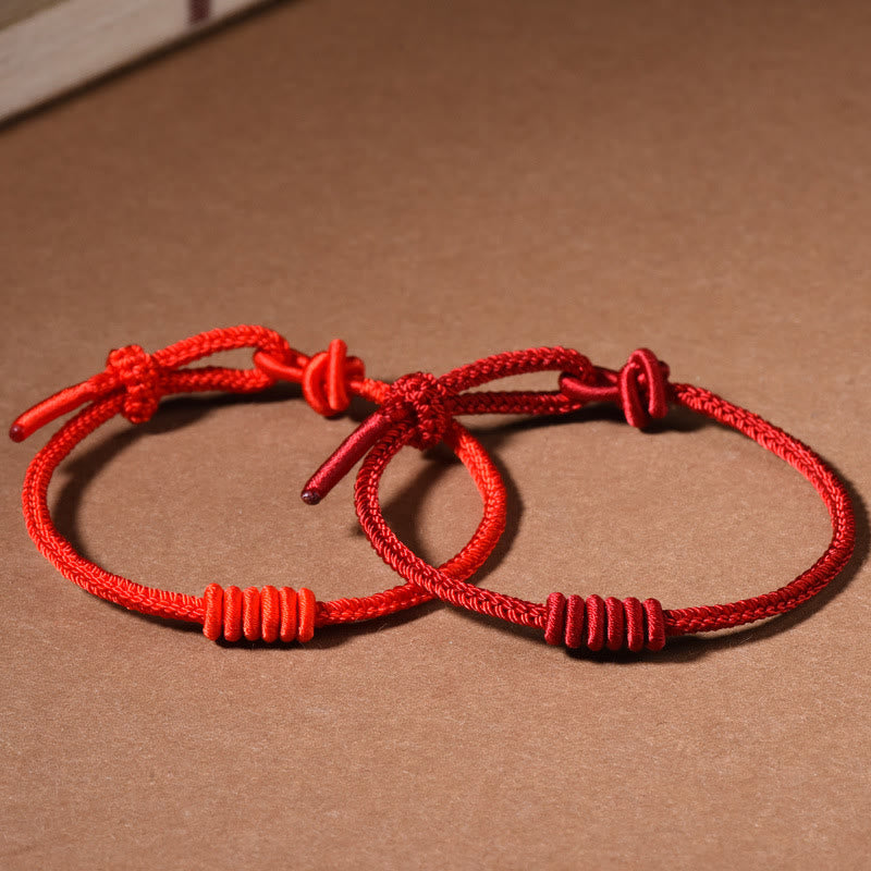 Braccialetto di forza con corda rossa a otto fili Buddha Stones