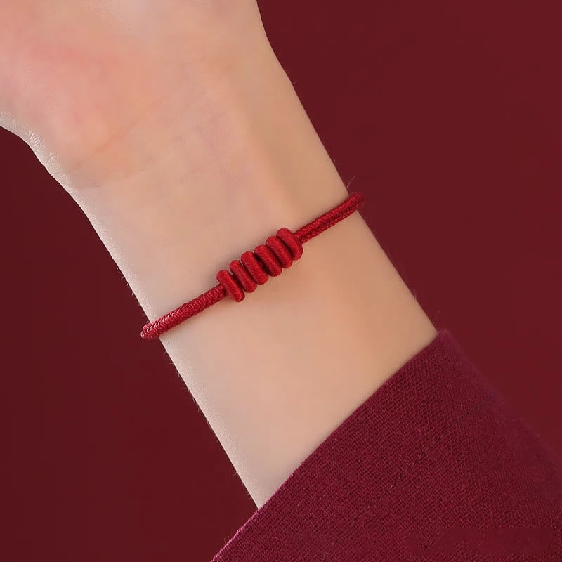 Braccialetto di forza con corda rossa a otto fili Buddha Stones