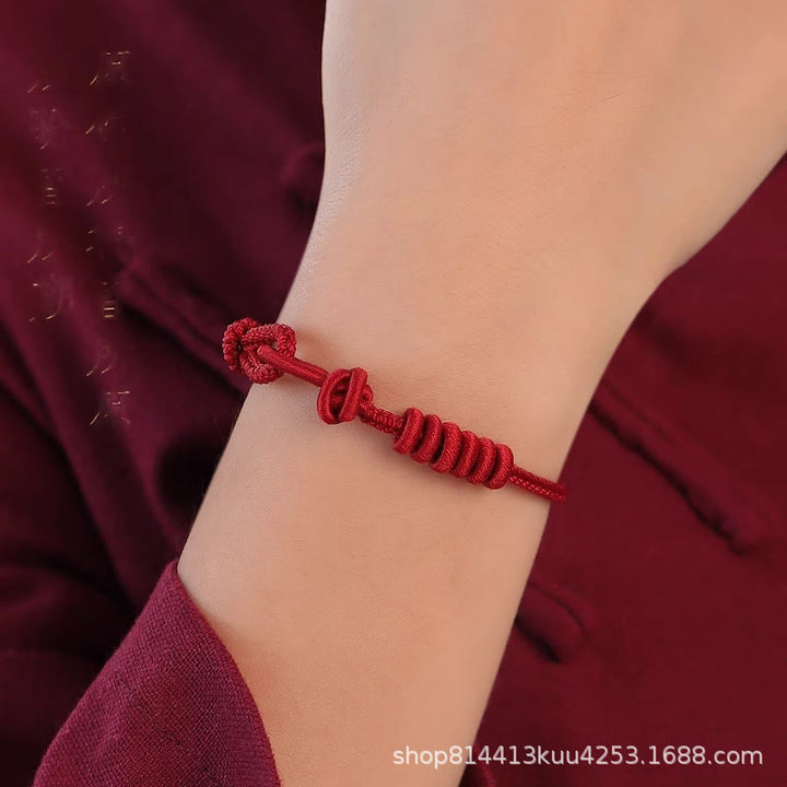 Braccialetto di forza con corda rossa a otto fili Buddha Stones