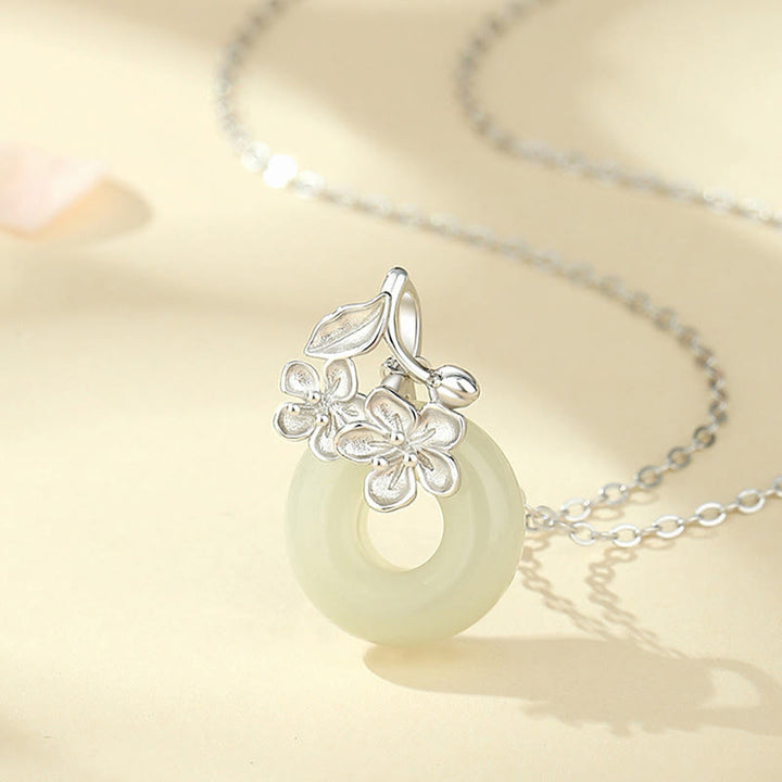 Collana con ciondolo a forma di fiore di pesco, fibbia della pace in argento sterling 999, Buddha Stones, giada di Hetian