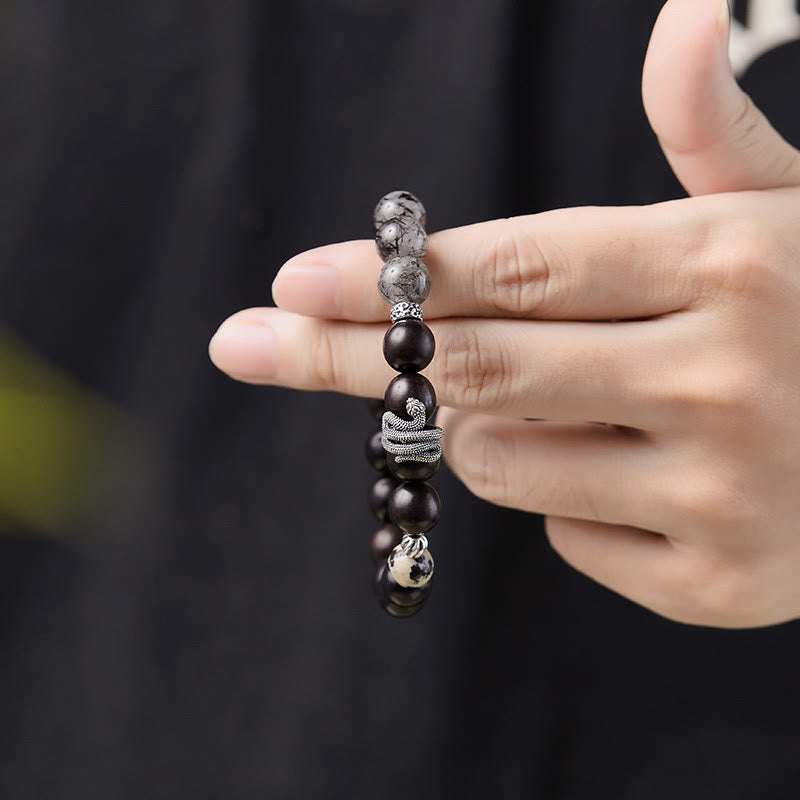 Braccialetto Buddha Stones in legno di ebano, quarzo rutilato nero, argento sterling 925, anno del serpente