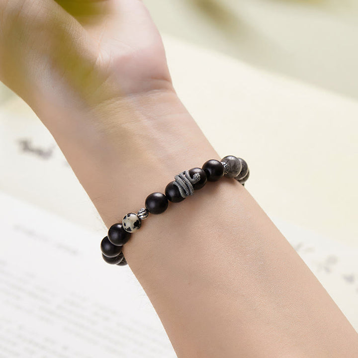 Braccialetto Buddha Stones in legno di ebano, quarzo rutilato nero, argento sterling 925, anno del serpente