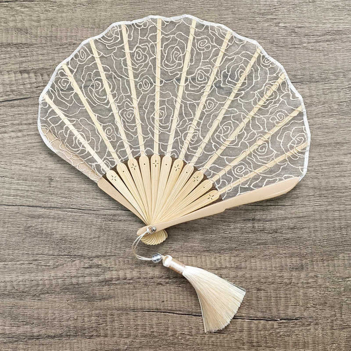 Ventaglio pieghevole in bambù con nappe a forma di conchiglia, ricamo a rosa, motivo Buddha Stones