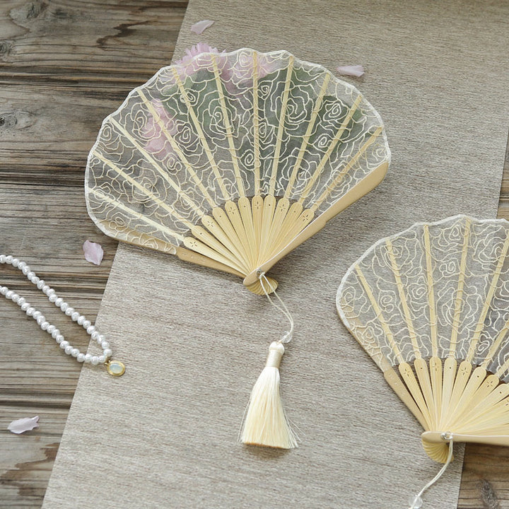 Ventaglio pieghevole in bambù con nappe a forma di conchiglia, ricamo a rosa, motivo Buddha Stones