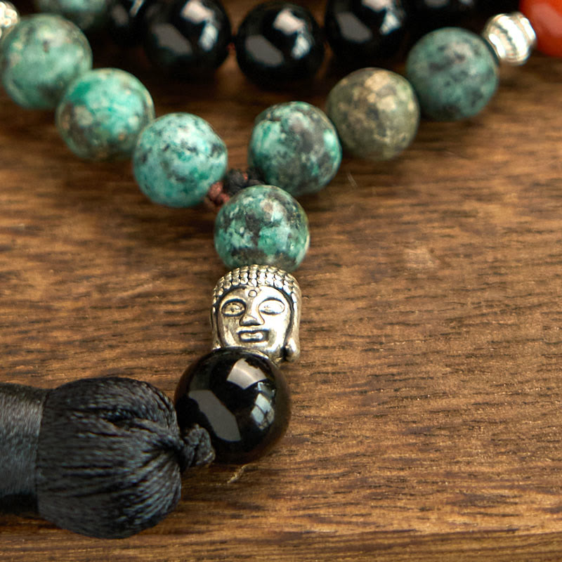 Buddha Stones 108 Mala Onice nero naturale Diaspro rosso Perline turchesi Braccialetto di protezione con nappa a testa di Buddha