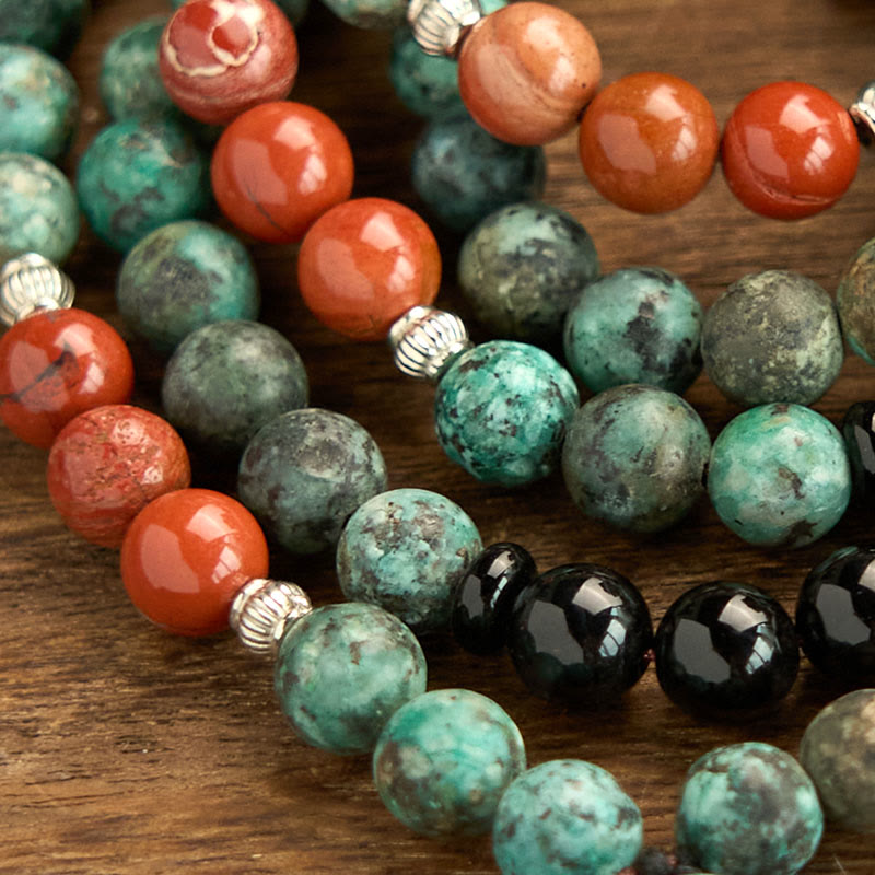 Buddha Stones 108 Mala Onice nero naturale Diaspro rosso Perline turchesi Braccialetto di protezione con nappa a testa di Buddha