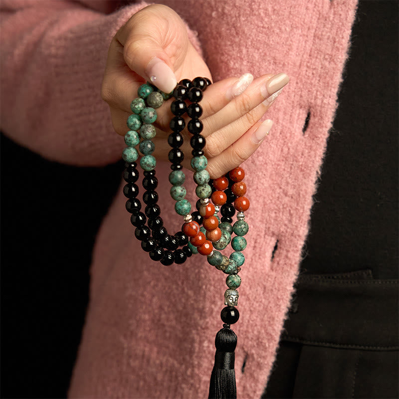 Buddha Stones 108 Mala Onice nero naturale Diaspro rosso Perline turchesi Braccialetto di protezione con nappa a testa di Buddha
