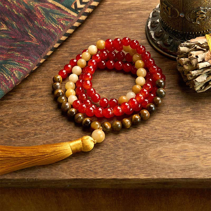 Braccialetto Buddha Stones 108 Mala Beads Agata rossa Occhio di tigre Nappa gialla Calma