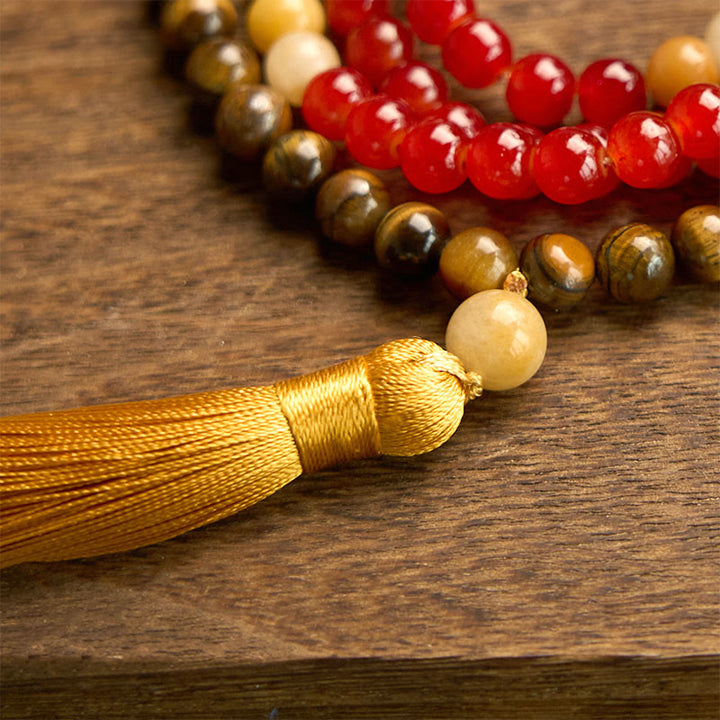 Braccialetto Buddha Stones 108 Mala Beads Agata rossa Occhio di tigre Nappa gialla Calma
