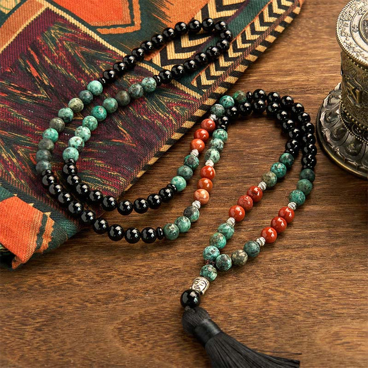 Buddha Stones 108 Mala Onice nero naturale Diaspro rosso Perline turchesi Braccialetto di protezione con nappa a testa di Buddha