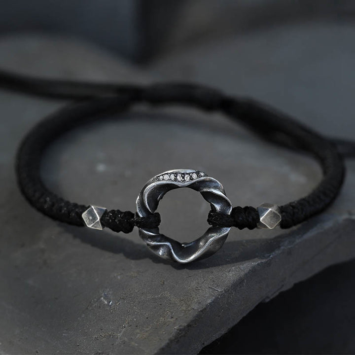 Braccialetto di protezione in corda di cera nera con fibbia della pace in argento sterling 999 Buddha Stones