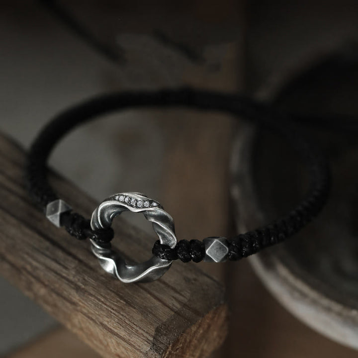 Braccialetto di protezione in corda di cera nera con fibbia della pace in argento sterling 999 Buddha Stones
